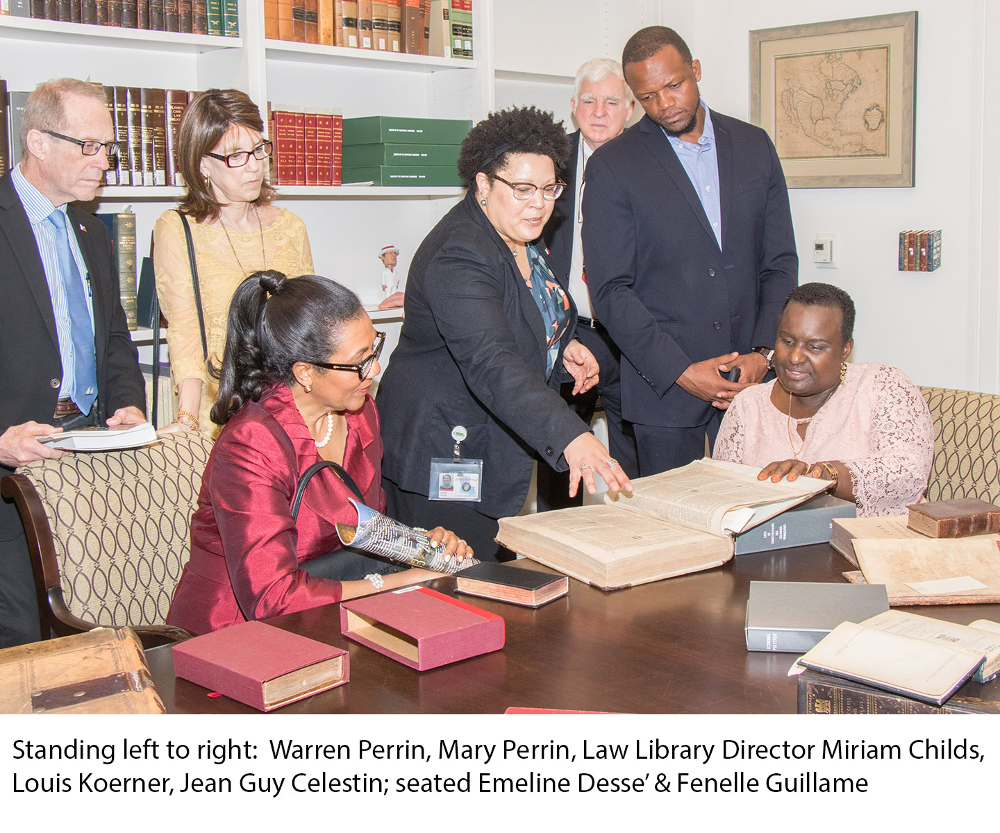 Standing left to right: Warren Perrin, Mary Perrin, Law Library Director Miriam Childs, Louis Koerner, Jean Guy Celestin; seated Emeline Desse & Fenelle Guillame
