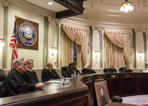 From left: Justice James T. Genovese, Justice Jefferson D. Hughes III, Justice John L. Weimer, Chief Justice Bernette Joshua Johnson, Justice Marcus R. Clark, Justice Scott J. Crichton, Justice Will Crain