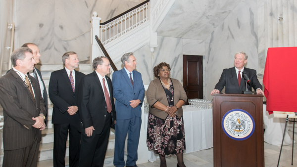 Justice Will Crain, Justice John L. Weimer, Justice Scott J. Crichton, Justice Marcus R. Clark, Justice James T. Genovese and Chief Justice Bernette Joshua Johnson with E. Phelps Gay, The Louisiana Historical Society at the Chief Justice Pascal F. Calogero, Jr. Naming Ceremony.