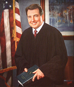 Associate Justice James L. Dennis
